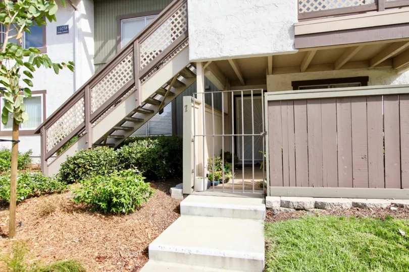 A sunny day in the area of Riderwood Gardens, Condo, tree, window, gated entrance