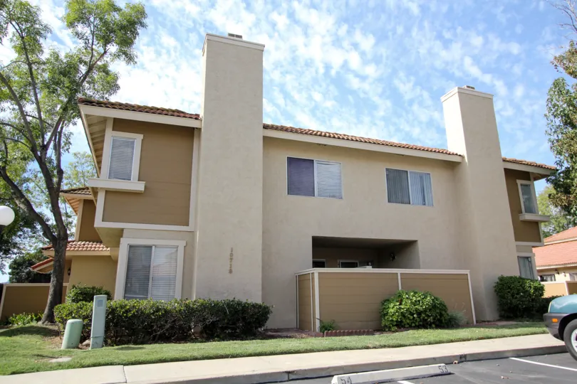 Riderwood Meadows community Santee California hidden doorways windows shrubbery tree tile roof courtyard