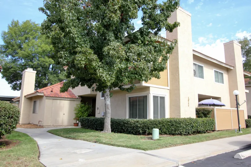 A sunny day in the area of Riderwood Meadows, Condo, tree, window, umbrella
