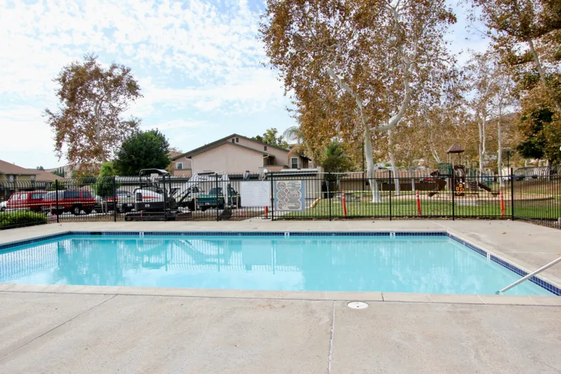 A sunny day at the Riderwood Village pool and park