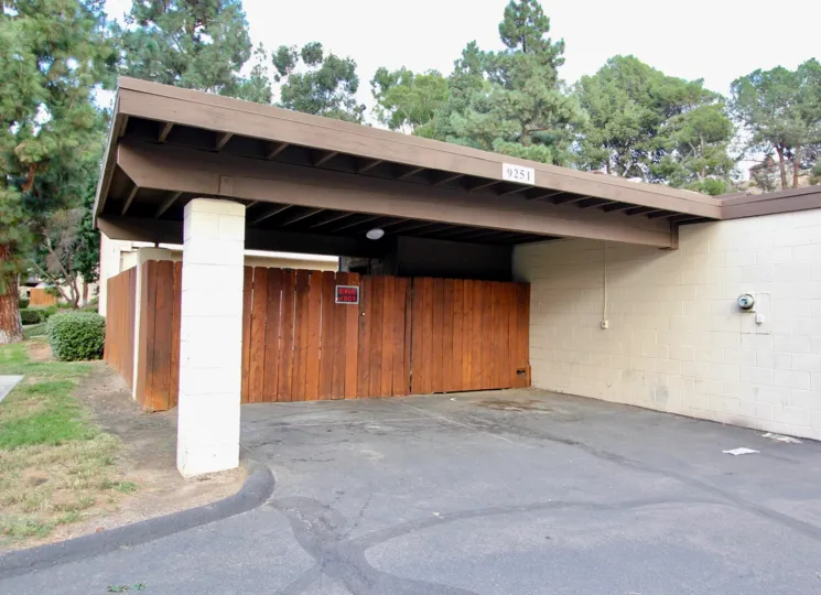 Privacy fence and covered parking area of private residence in Rio Terrace.