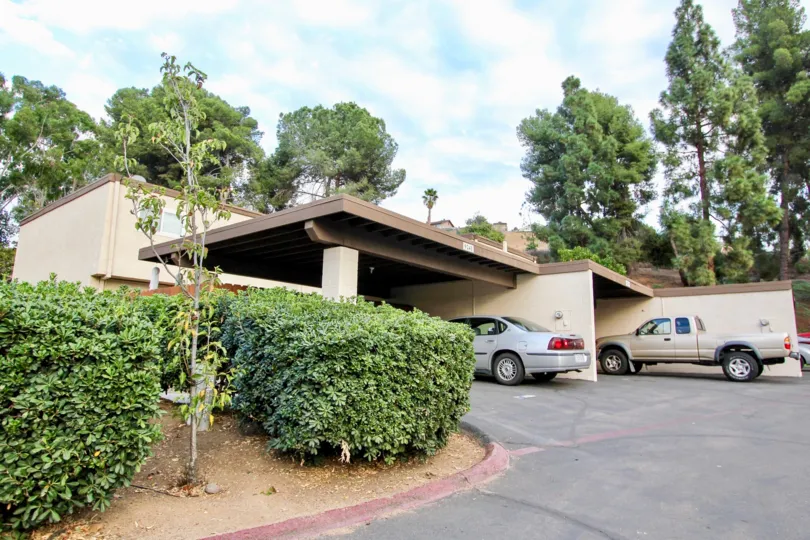 Vehicles parked in front of an apartment building in Rio Terrace in Santee, CA.