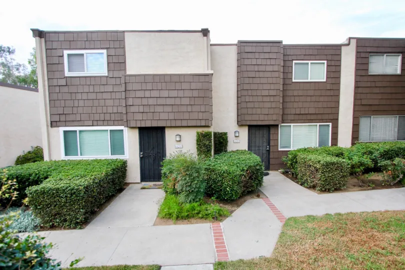 Rio Terrace, Santee, California, wood tiles, two story, bushes