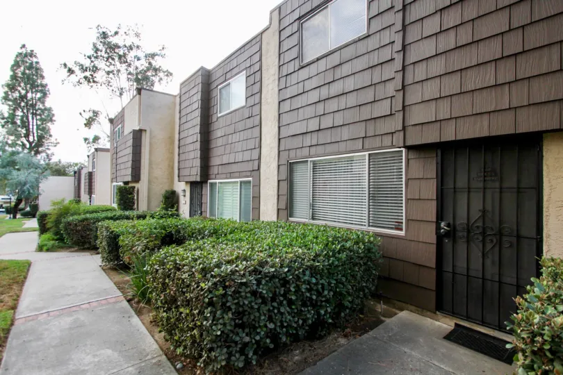Rio Terrace , Santee , California,brown building,black gate