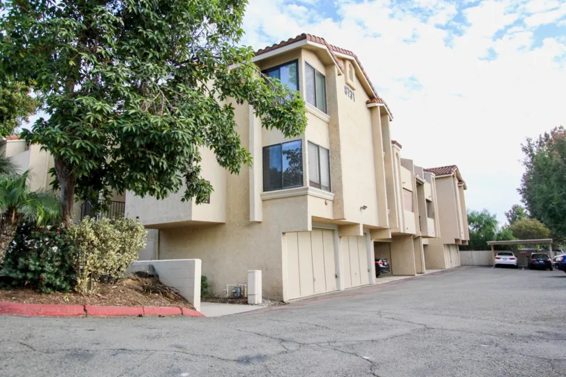 Driveway next to three story residential complex at Town Villas in Santee California