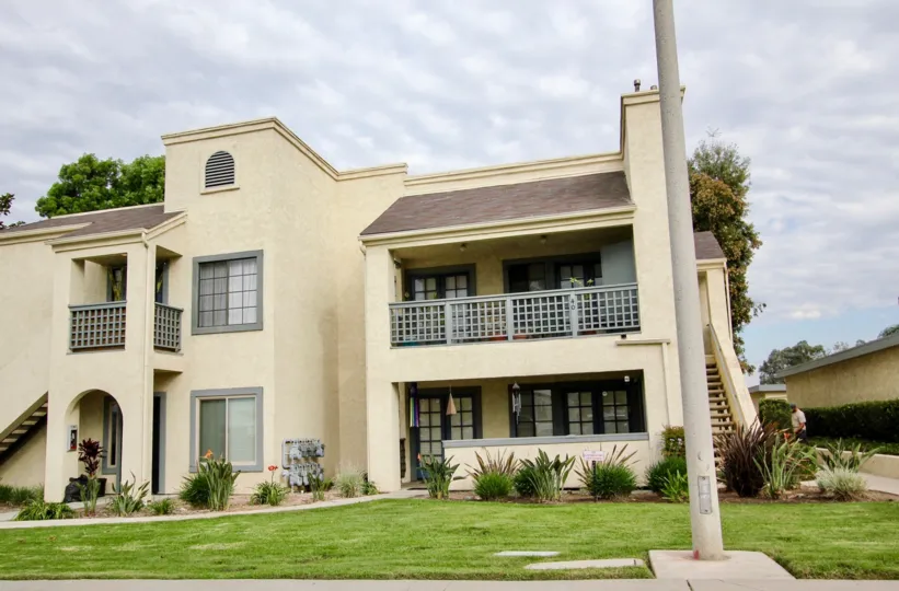 The front of a modern apartment home building with spatious balconys in Vista Del Rio