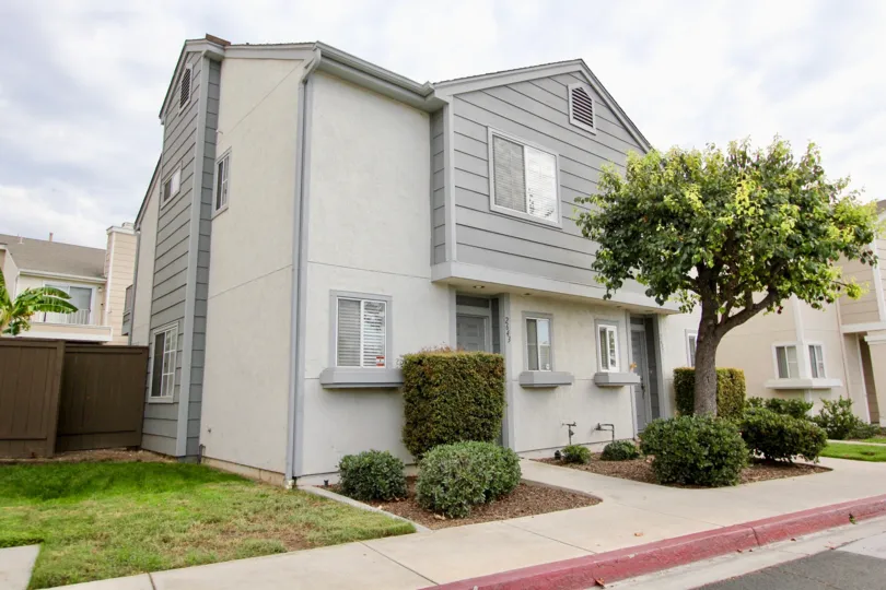 A two-storey residence with grayish tone in the Ashford Park neighborhood.