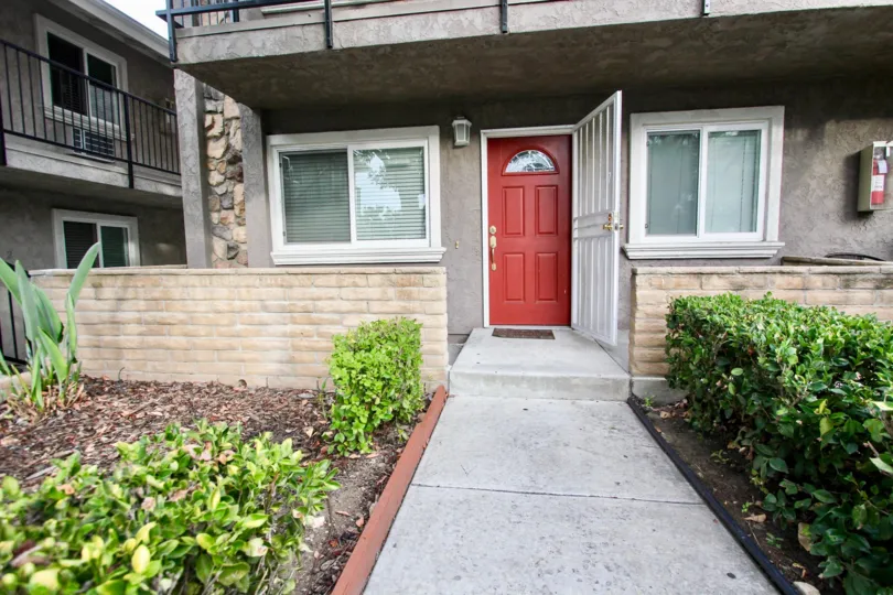 Walkway leading to doorway of a residence at Buena Vista Condominiums in Spring Valley California
