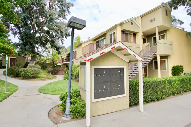 A front view of the sunny Canyon Villas complex in lovely Spring Valley California.