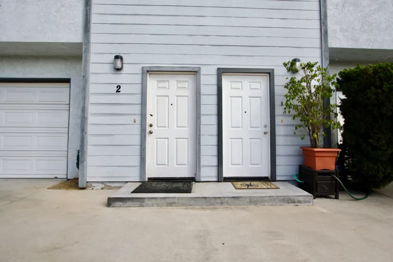 Goodland Acres ,: Spring Valley, California, white door,potted plant