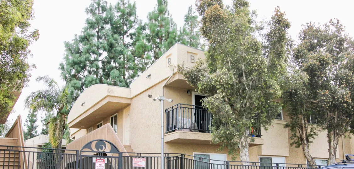 Helix De Oro  ,Spring Valley , California,beige building,balcony