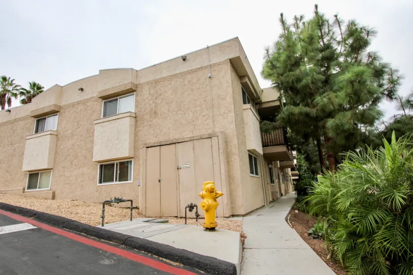 Helix De Oro, Spring Valley, California, stucco, pine trees, two story