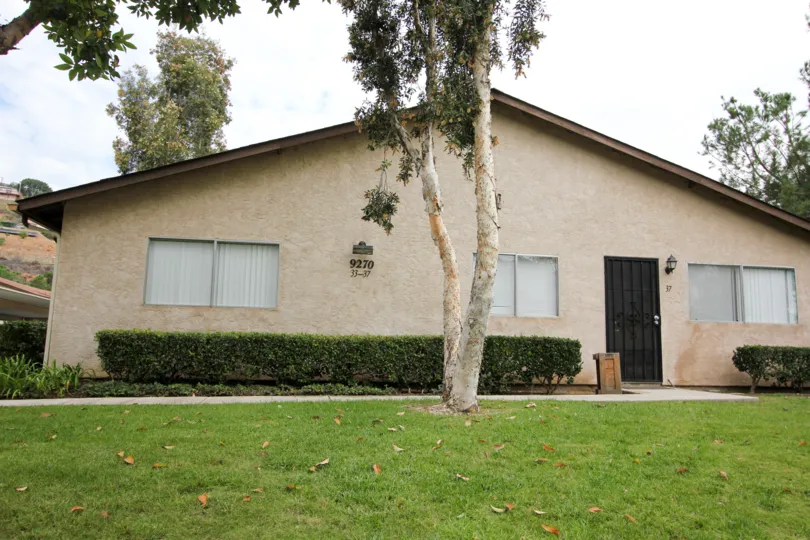 Front entrace view with tree of Hidden Valley community, Spring Valley, CA