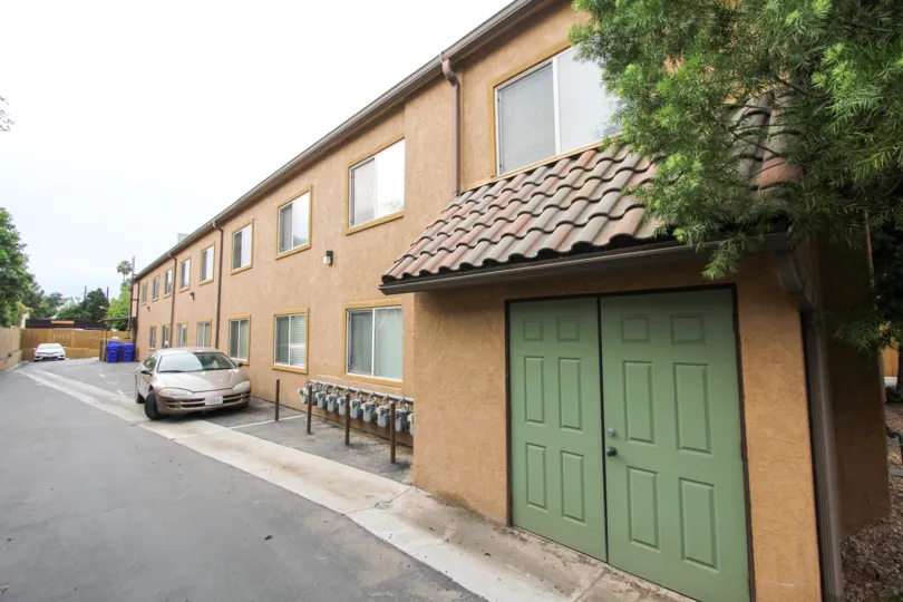 Two green doors leading into the San Remos Villas in Spring Valley CA