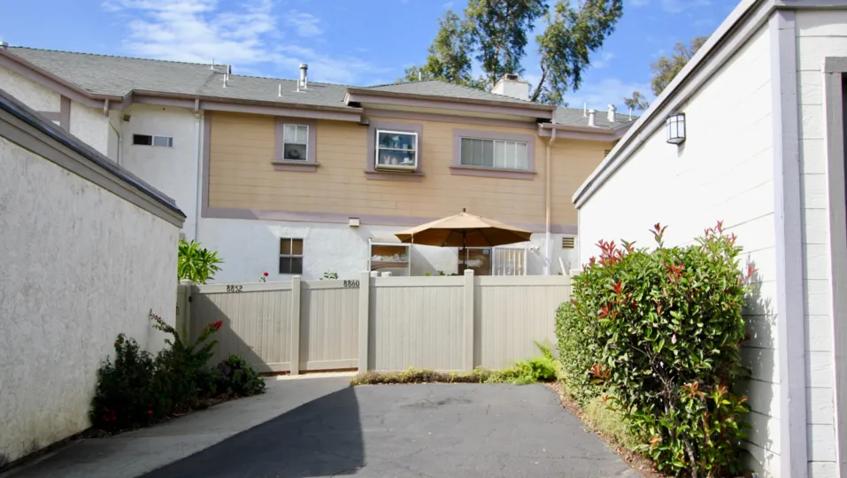 A two-storey multi-color townhouse in the Spring Canyon neighborhood.