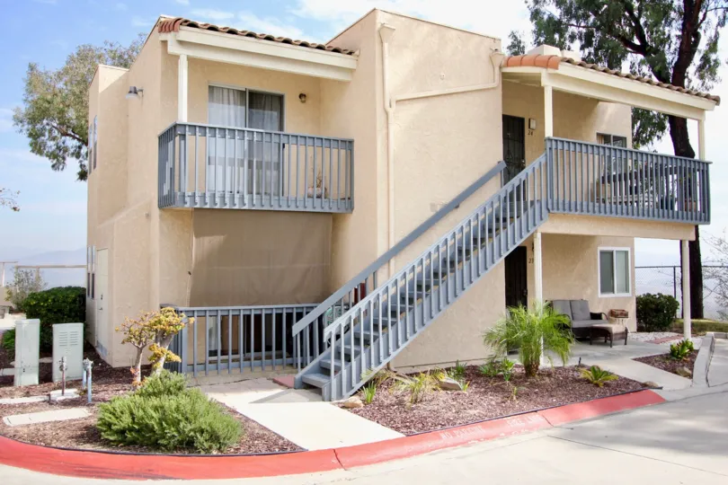 Upper and lower balconies with unobstructed views with front and back landscaping in Spring Valley