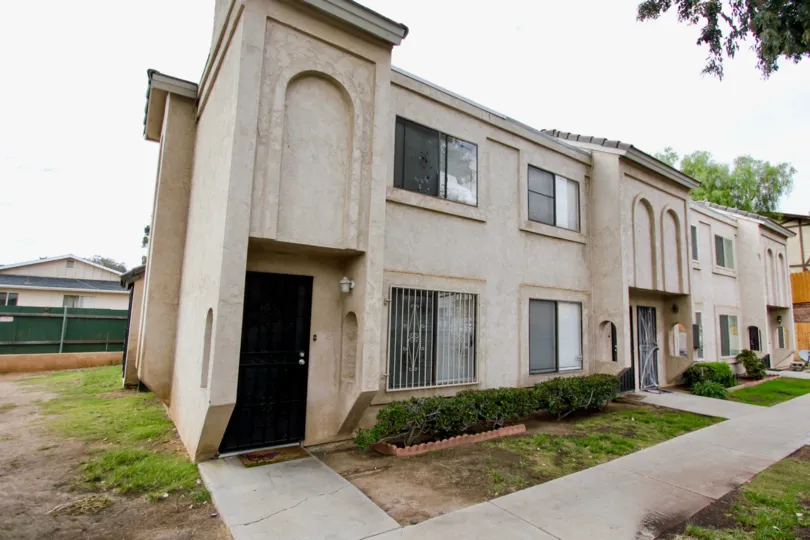 A two-storey townhouse with arched walls n the Valley Springs neighborhood.