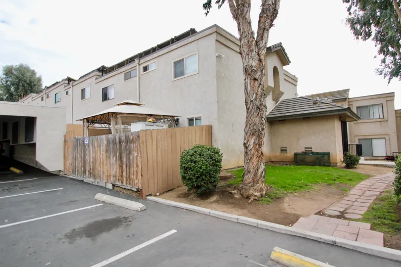 Side view of parking and side yard in Valley Springs community, Spring Valley, CA