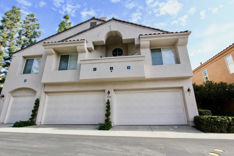 Two story housing with attached garages at Andria in University City California