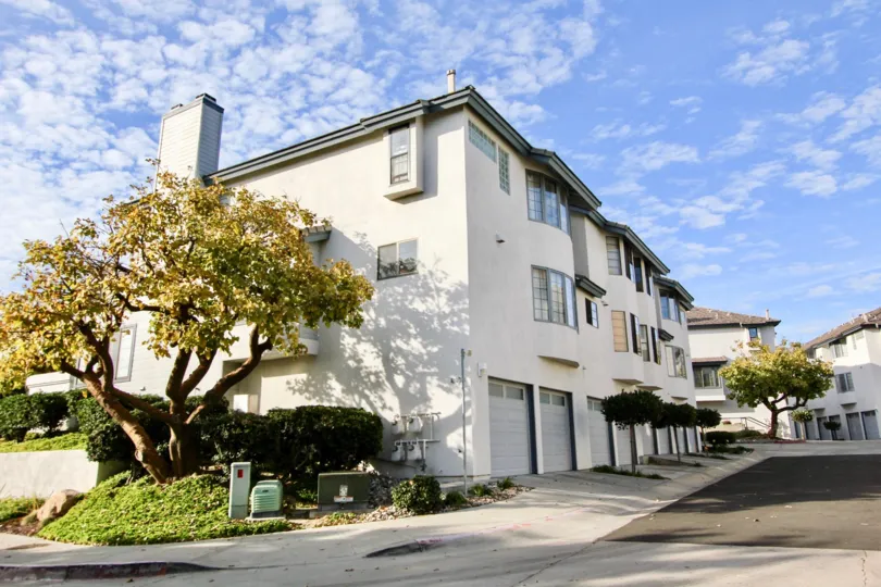 Another blue sky filled with clouds at the Cambridge Terrace in University City, California.