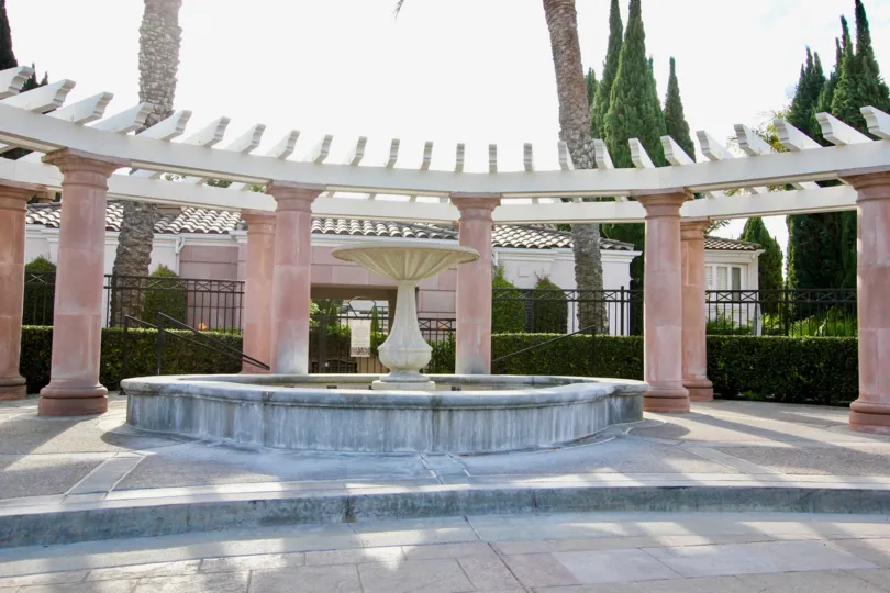 Awesome fountain decorated with plants and trees in Casabella
