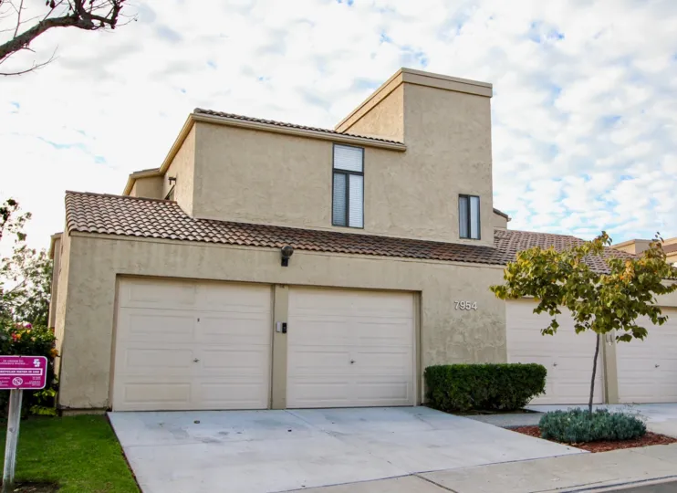 Modern 2 story house with multiple garages in the back, located in Dieguenos, University City, California