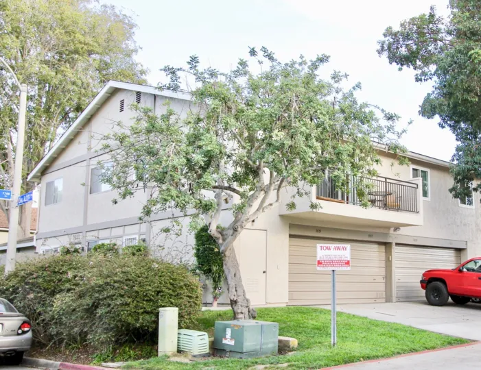 Lush greenery surrounds private parking at Genesee Highlands in University City, California.