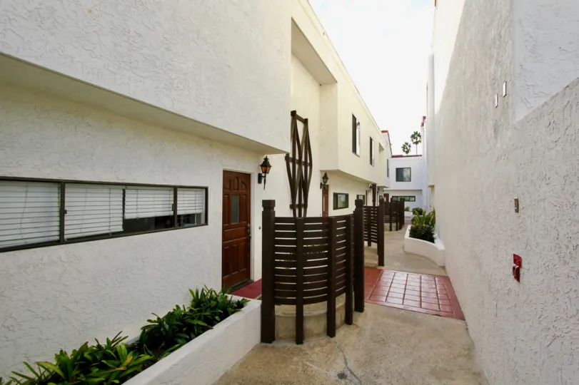 Walkway between housing units at La Jolla Garden Villas