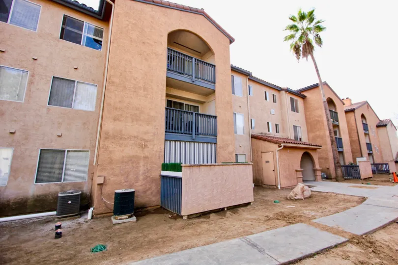 Lucera Community in University City, California, Front View with Palm Tree