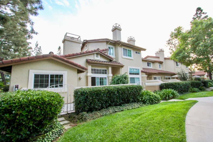 THE BUNGALOW IN THE MADRID, WITH TREES, GRASSLAND, GATE, GLASS WINDOWS, PATHWAY.