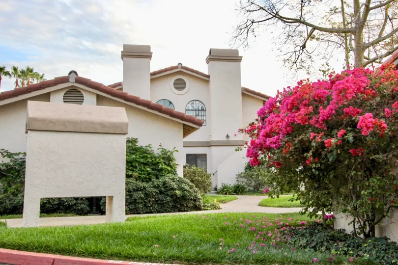 A shot of flowering landscaping and manicured lawn at Marbella