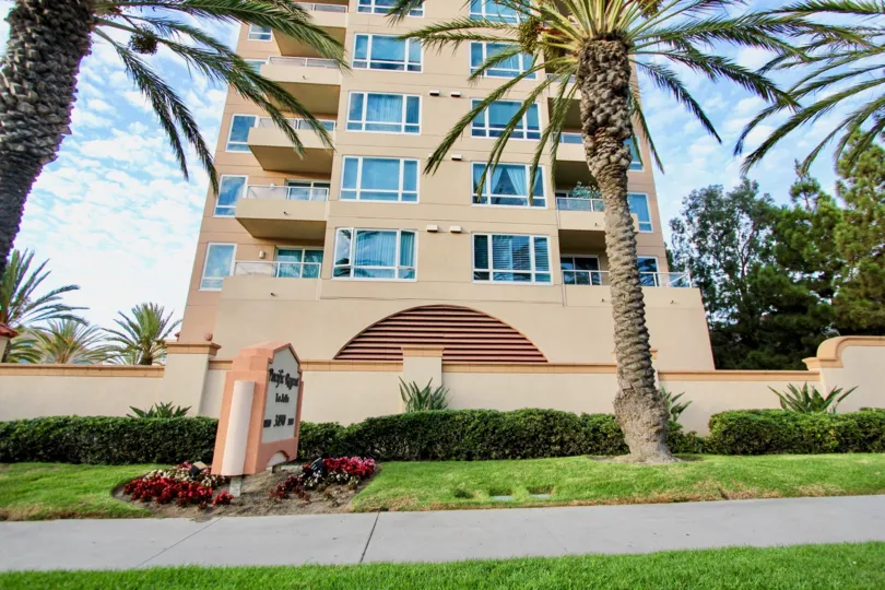 Compound view of the building with trees plants and compound wall in Pacific Regent La Jolla