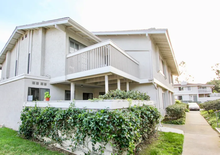 Corner side view of a home in the Playmor Terrace West community in University City, California