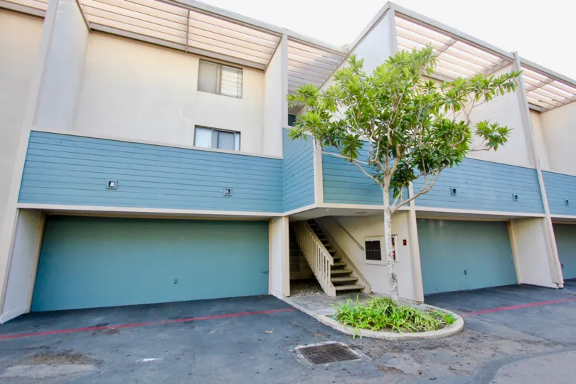 The light blue garage doors on The Park community in University City CA
