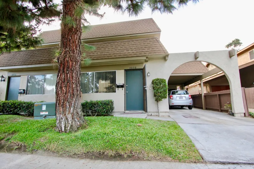 Home with driveway and front yard at University Woods in University City California