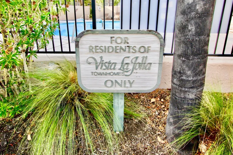 A fenced in pool area for the residents of Vista La Jolla Townhomes