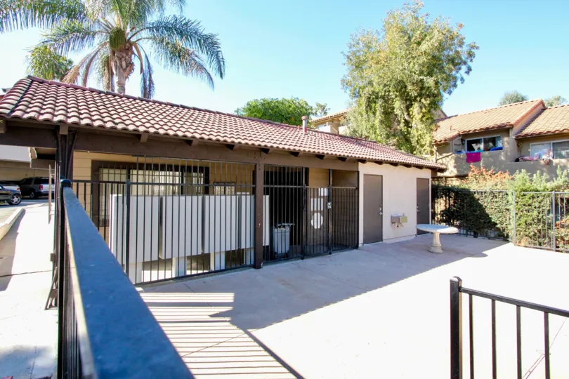 A clean and well kept bathroom facility at the sunny Buena Vista Townhomes complex in Vista, California