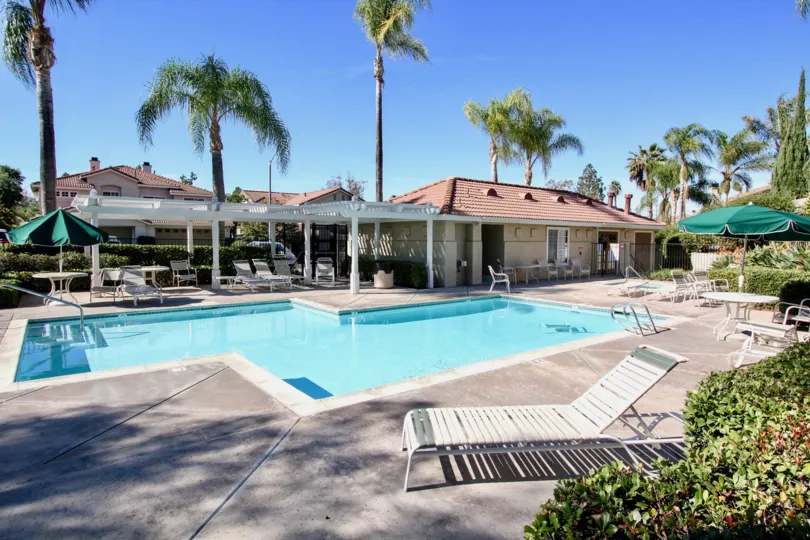 A beautiful swimming pool in front of California Capri community