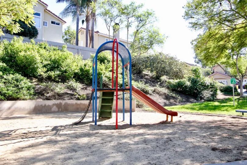 A sunny day in the kids play area of the California Capri community park.