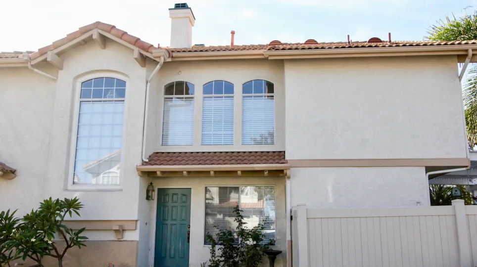 Front of a house with tree windows in the California Villas