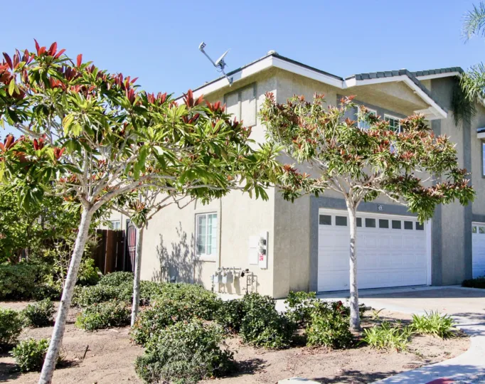 Housing with attached garage at California Vistas in Vista California