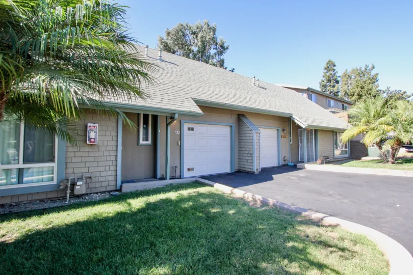 The Villa's in Citrus Grove has meadow with plants and trees
