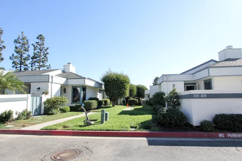 White stucco and perfect lawns are yours at Copper Hill in Vista, CA