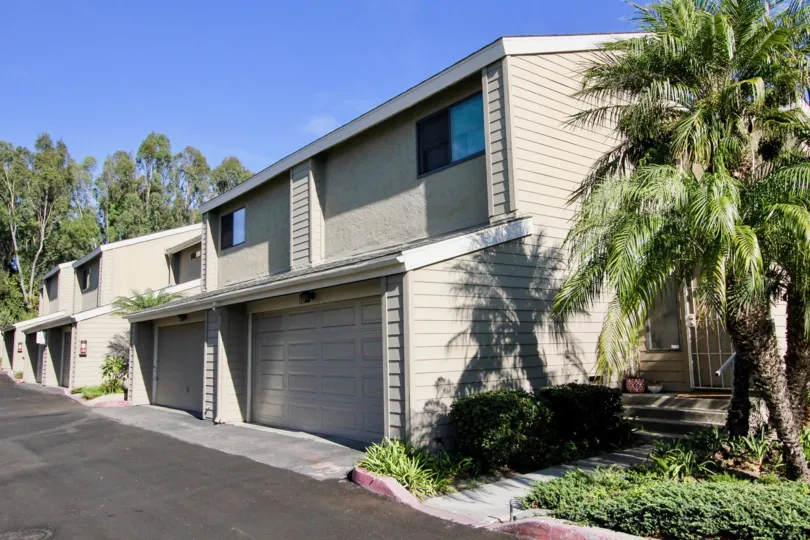 Housing with attached garages at Durian Place Townhomes in Vista California