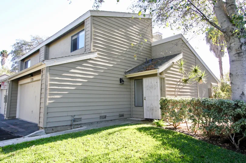 Vinyl siding one car garage in Durian Place Twonhomes in Vista, CA