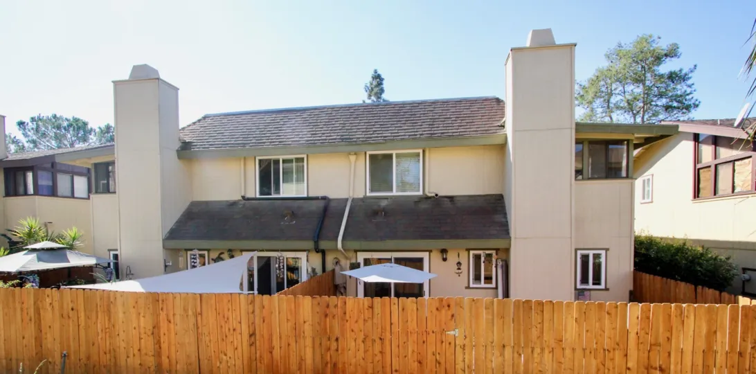 Two story townhomes with wooden fence at Marli Terrace in Vista California