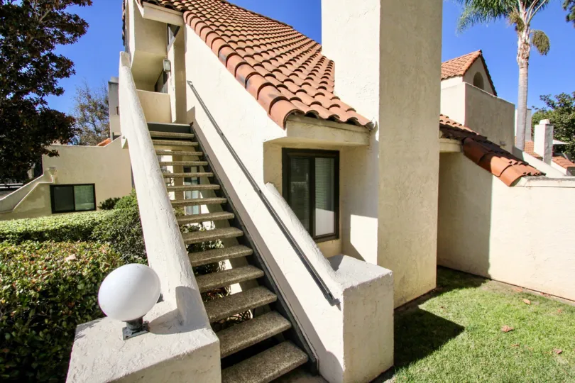 Beautiful stucco and terra cotta residence at Melrose Park in Vista, CA