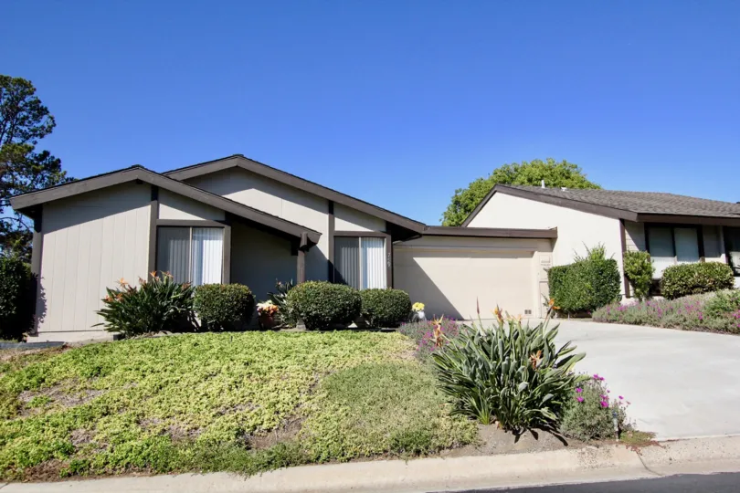 Housing with front yard and driveway at Nob Hill in Vista California