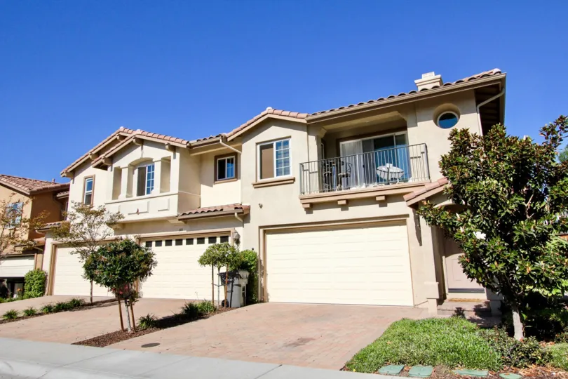 Brick drive and garage at the residential Oak Drive Villas located in Vista, CA