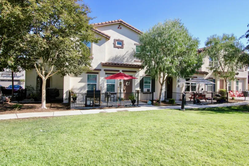 Sunny lawn in front of Santa Fe Walk in Vista California
